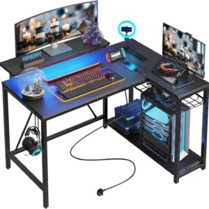 Bestier Small Gaming Desk with Power Outlets,42 L Shaped LED Computer Desk with Stand Reversible Shelves,Corner Gamer Desk with Headset Hooks USB Charging Port,Carbon Fiber Black